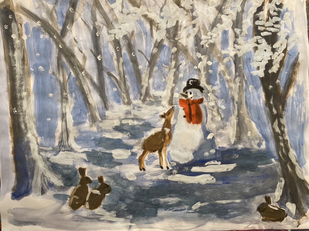 Peinture d'un bonhomme de neige par un élève